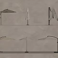 Different Styles of Sunshades Open and Folded Displayed on Shelves in Beige Light Brown