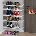 Multi Tiered White Corner Shoe Rack Organizing Various Shoes In Home