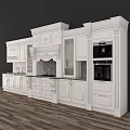 White European Style Kitchen Cabinets With Carved Details And Marble Countertops