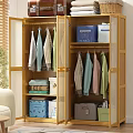 Organized Wardrobe Interior With Hanging Clothes Storage Boxes And Folded Garments