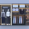 Modern Display Shelves With Mannequins Folded Clothes Hanging Shirts And Bags For Happy Boy
