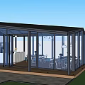 Modern Glass Garden Sunroom With Transparent Walls And Outdoor Seating Area