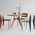 Modern Round Wooden Table and Colorful Chair Set with Vase Fruit Bowl and Laptop