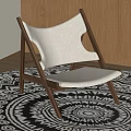 Modern Wooden Frame Accent Chair With White Upholstered Seat On Black And White Patterned Rug