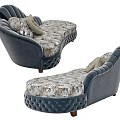 Navy Blue Tufted Chaise Lounge with Floral Patterned Cushion and Decorative Pillows
