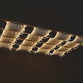 Decorative White Fabric Strips Hanging On Wooden Rack With String Lights 3d model