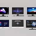 Various Computer Monitors Showing Different Display Screens and Matching Keyboards Mice