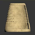 Golden Metallic Thimble Sculpture With Intricate Diamond Patterns And Base Stripes On Reflective Surface