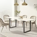 Modern Dining Table Set with White Surface Black Legs Light Chairs and Golden Pendant Lights