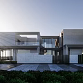 Modern Townhouse Exterior With Large Glass Windows And Neat Greenery Front