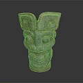 Ancient Bronze Beast Mask Sculpture Carving Featuring Symmetric Patterns And Greenish Patina