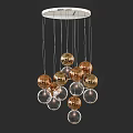 Modern Chandelier With Glass And Gold Spheres Hanging In Cluster Arrangement