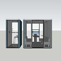 Public Office Space With Blue Private Booths Interior Desks Chairs Sofa And Monitor