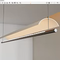 Modern Linear Pendant Light With Curved Top And Warm Illumination For Dining Space