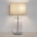 Modern Minimalist Table Lamp With Beige Fabric Shade And Transparent Glass Base