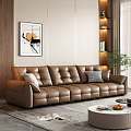 Brown Leather Sectional Sofa With Cushions Against Light Colored Wall Abstract Painting And Green Plant