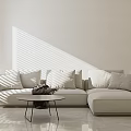 Modern Sectional Sofa In Living Room With Plush Pillows Coffee Table And Sunlight