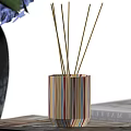 Decorative Ornament Set With Striped Diffuser Yellow Reed Sticks Blue White Vase And Purple Flowers