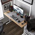 Modern Home Office Desk Setup With Monitor Keyboard Mouse Speakers Potted Plant And Framed Artwork