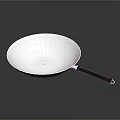 Silver Metal Wok With Black Handle And Shiny Reflective Surface