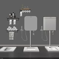Bathroom Setup with Gray Wall Black Shelf White Towel Toilet Rolls Water Tank Squatting Pan