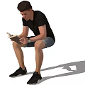 Man Sitting Casually Reading Book In Black T-Shirt Denim Shorts And Black Sneakers With Shadow