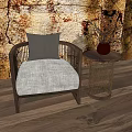 Modern Single Seater Sofa With Wooden Frame Side Table Red Vase Plants And Textured Wall