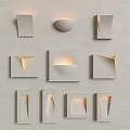 Unique Shaped Wall Lamps with Soft Warm Glow Mounted on Light Gray Wall