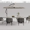Modern Outdoor Dining Table And Chairs With Cantilever Umbrella Fruit Tray And Plant