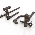 Vintage Rusty Metal Pipe Fittings With Valves And Handles On White Surface