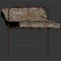 Vintage Iron Frame Bench With Floral Patterned Cushion And Decorative Metal Legs