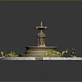 Garden Ornament Circular Tiered Fountain Surrounded by Small Plants and Stone Borders