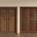 Classic Wooden Doors With Golden Knockers Carved Circular Patterns And Brass Rivets