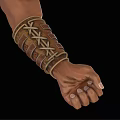 Detailed Leather Bracer With Metal Buckles On Clenched Fist Against Black Background