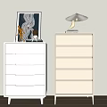 Modern White and Beige Chest of Drawers with Framed Artwork Table Lamp and Figurines