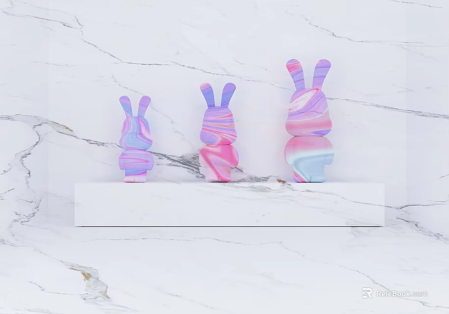 Three Vibrant Rabbit Sculptures with Pink Purple Blue Hues on Marble Tabletop 3d model 