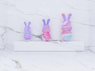 Three Vibrant Rabbit Sculptures with Pink Purple Blue Hues on Marble Tabletop 3d model