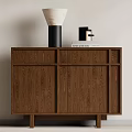Wooden Decorative Cabinet with Oak Finish Adorned with Vase and Books in Modern Living Space