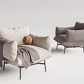 Light Colored Single Seater Sofa With Gray Blanket Woven Ball And Metal Legs