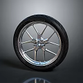 Motorcycle Black Tread Tire With Silver Spoke Wheel Rim And Glossy Reflection