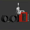 Two Cylindrical Mechanical Structures With Red Stripes Top Gauges And Black Circular Parts