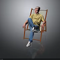 Man Sitting On Orange Folding Chair Wearing Yellow T Shirt Blue Jeans And White Shoes