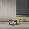 Modern Living Room Interior With Black Round Coffee Table And Yellow Side Table