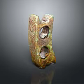 Ancient Style Carved Sculpture with Intricate Surface Patterns Two Circular Holes and Bronze Patina Finish