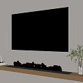 Wall Mounted Television With Display Screen Above Fireplace And Wooden Shelf With Plant