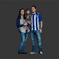 Happy Family Portrait With Parents And Child Standing Together In Casual Clothing