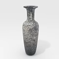 Fresh Green Plants Displayed In Slender Gray Black Crackle Textured Vase