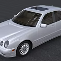 Silver Mercedes Sedan With Sunroof Sleek Body Design And Shiny Wheels