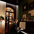 Elegant Live Stream Room With Rose Patterned Relief Wall Floor Lamp And Green Plants