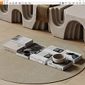 Stacked Coffee Table Books And Magazines With Mugs On Neutral Rug Modern Home Decor
